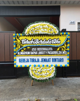 Papan Bunga Duka di Puhun Pintu Kabun